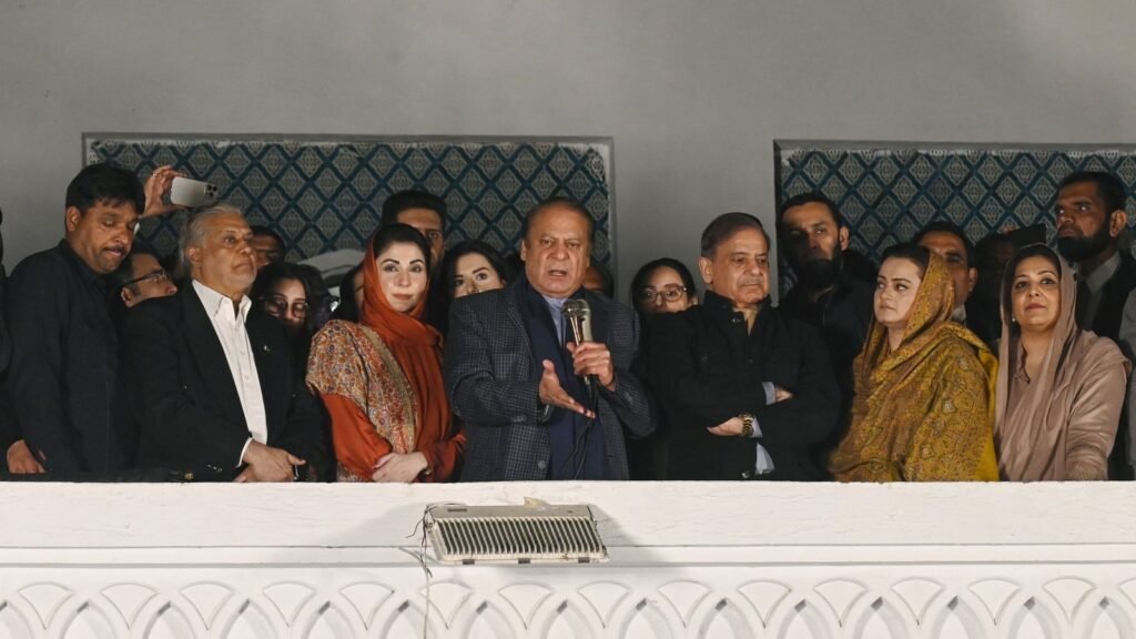 Pakistan's former Prime Minister Nawaz Sharif (C) delivers a speech during a gathering with his supporters a day after Pakistan's national elections. (AFP)